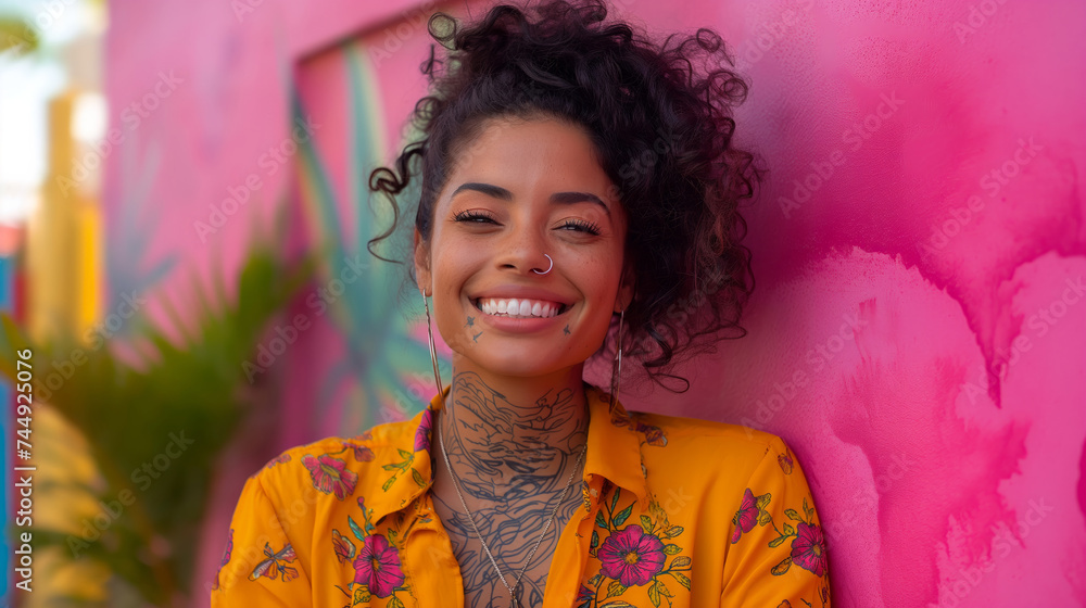 Urban Chic: Stylish Woman with Floral Shirt and Tattoos Against Pink Wall Urban Chic: Stylish Woman with Floral Shirt and Tattoos Against Pink Wall