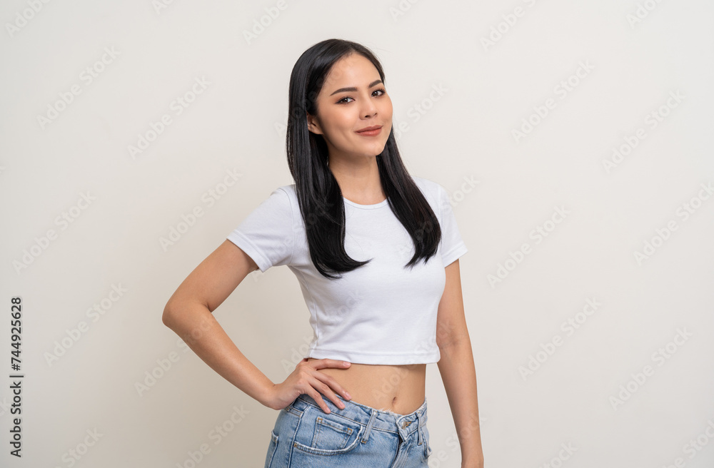 Beautiful smiling happy young asian woman age around 25. Charming female lady standing pose on isolated white background. Asian attractive woman people looking camera confident with backdrop. Beautiful smiling happy young asian woman age around 25. Charming female lady standing pose on isolated white background. Asian attractive woman people looking camera confident with backdrop.