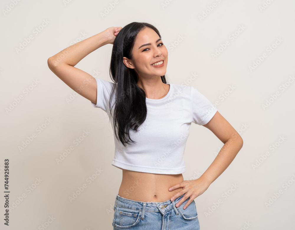 Beautiful smiling happy young asian woman age around 25. Charming female lady standing pose on isolated white background. Asian attractive woman people confident on backdrop. Beautiful smiling happy young asian woman age around 25. Charming female lady standing pose on isolated white background. Asian attractive woman people confident on backdrop.