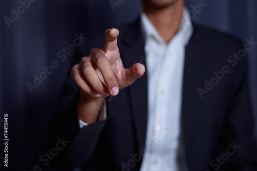 Businessman touching imaginary screen successful business idea