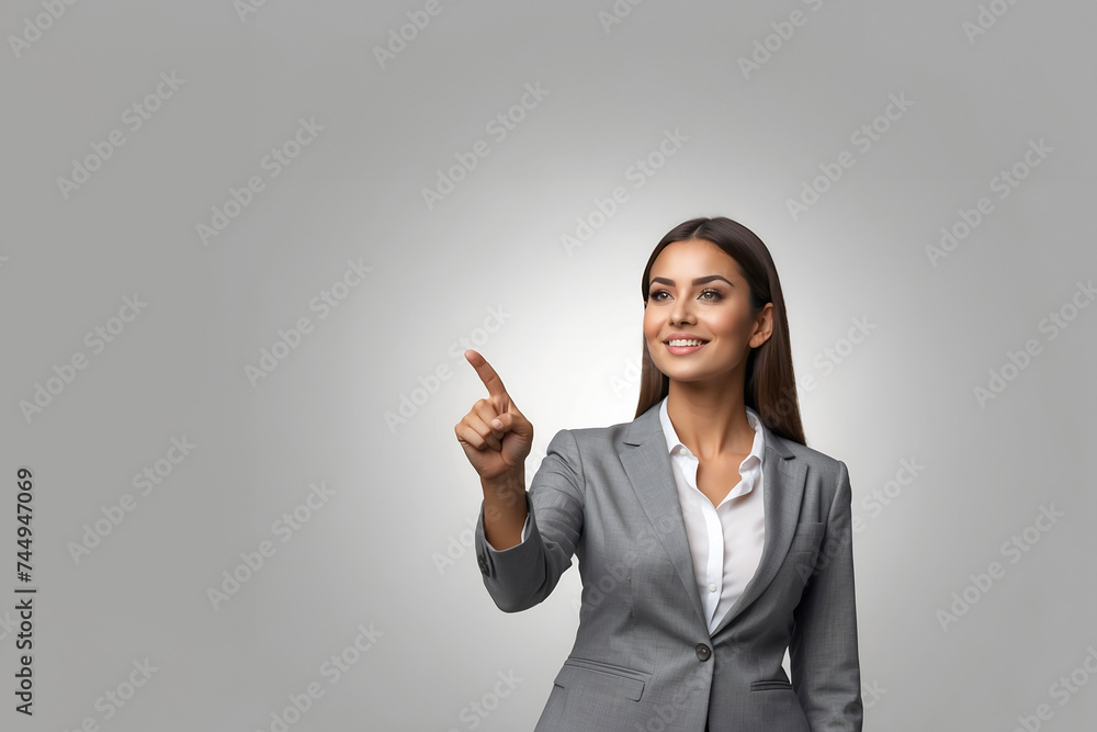 Young beautiful business woman pointing to empty copy space isolated on white background Young beautiful business woman pointing to empty copy space isolated on white background