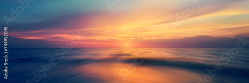 Motion blurred background of sunset on the sea © john