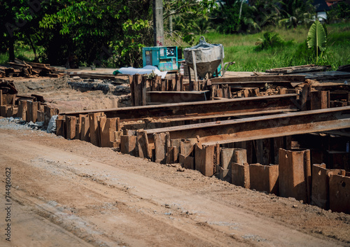 Big road construction site with special machinery in the construction area