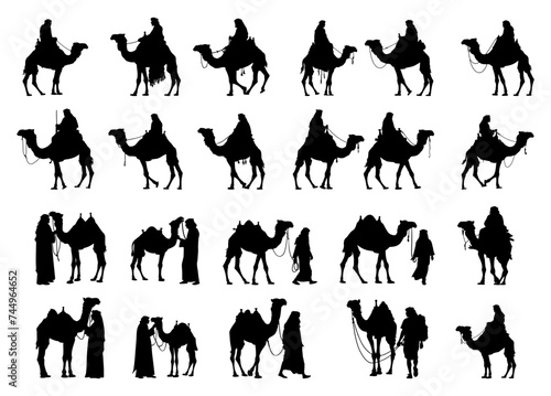 silhouette arabic man with camel. traditional arab clothes dress. islolated on background. photo