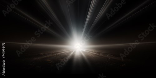Abstract light rays illuminating on a black background.

