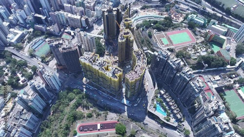 Dilapidated building in Hung Hom Whampoa To Kwa Wan Ho Man Tin near Kowloon Hong Kong, was demolished and rebuilt into a boutique residential apartment. Community redevelopment  photo