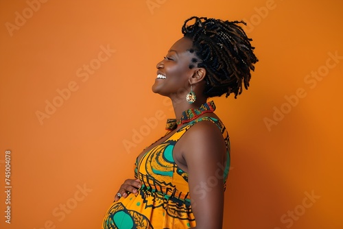 Side view of pregnant afro woman 
