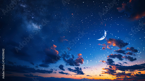 Night sky with clouds, moon and stars photo