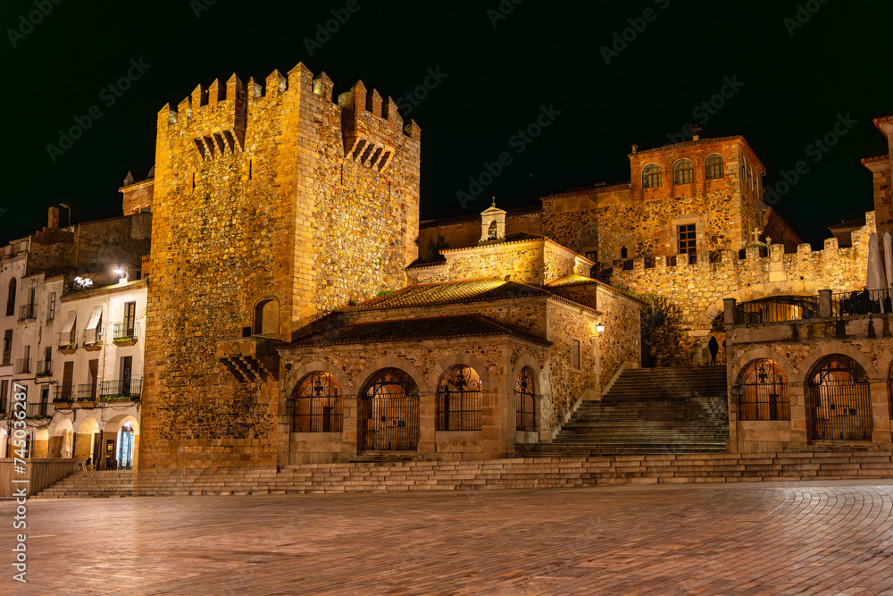 Night view of the medieval city of Caceres with its medieval monuments, Extremadura.