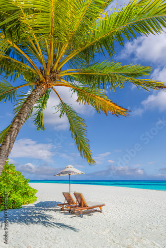 Beautiful panoramic sea sand sky. Tropical relax beach sunny summer island landscape. Love couple chairs umbrella palm leaves romantic coast. Luxury travel destination. Honeymoon vacation best holiday