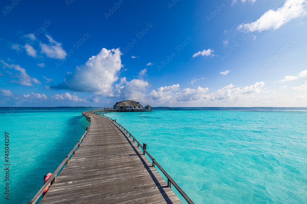 Amazing sea bay relax sky exotic coastal landscape Maldives beach. Tropical azure blue seascape, luxury water villa resort wooden pathway jetty. Stunning travel destination summer vacation tourism