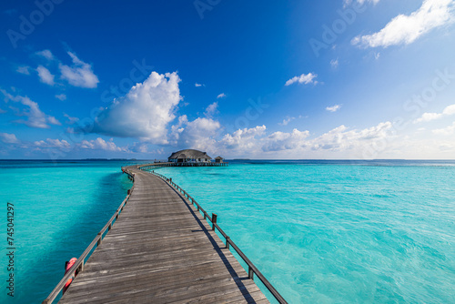 Amazing sea bay relax sky exotic coastal landscape Maldives beach. Tropical azure blue seascape, luxury water villa resort wooden pathway jetty. Stunning travel destination summer vacation tourism