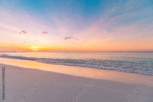 Summer nature sea sand sky, sunrise colors clouds, horizon, tranquil background banner. Inspirational nature landscape, beautiful colors, wonderful scenery tropical beach. Beach sunset vacation coast