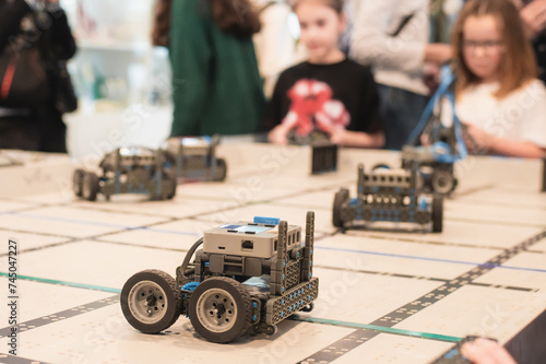 robot competitions, children control robots. High quality photo