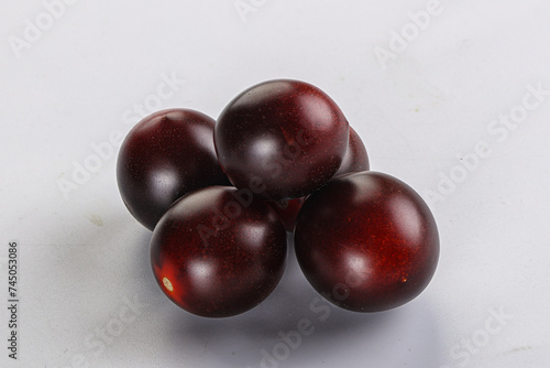 Raw ripe black kumato tomato