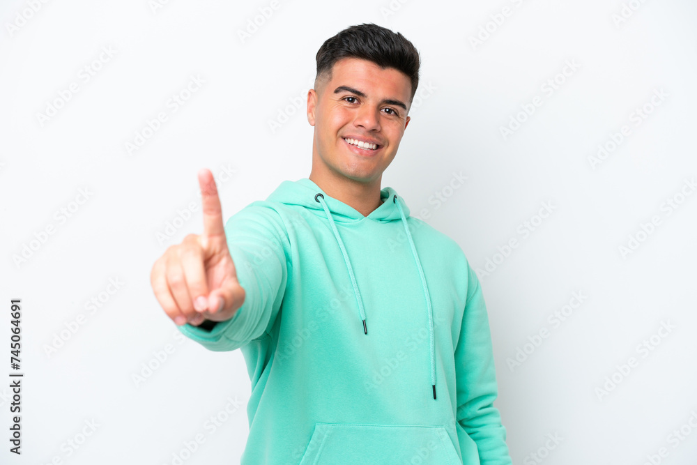 Young caucasian handsome man isolated on white background showing and lifting a finger Young caucasian handsome man isolated on white background showing and lifting a finger