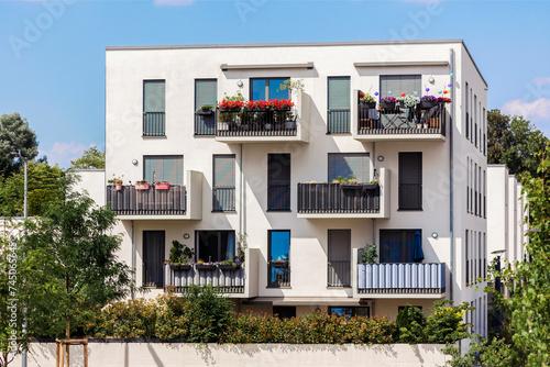 Modern Block of Flats, EU Modern European Complex of Apartment Building with Modern Facade Exterior Design in Green City. © Maryana