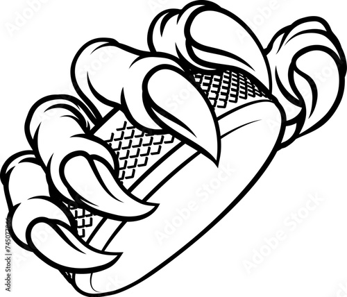 An ice hockey claw sports illustration of an eagle or animal monster hand holding a hockey puck