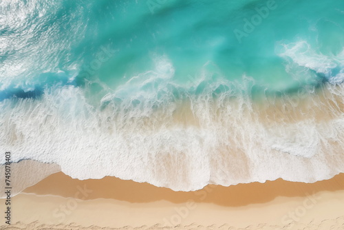 Serene bliss captured. A scene of gently azure sea meeting sun-kissed yellow sands, adorned by white waves viewed from above. Pure relaxation and seaside tranquility