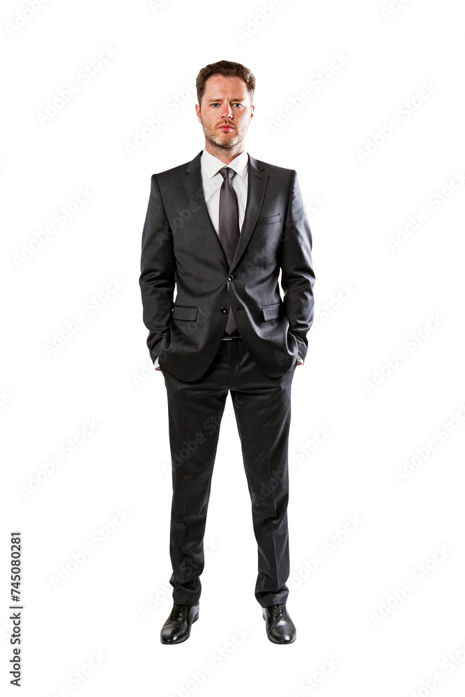 Serious businessman in classic black suit, standing with hands in pockets, isolated on white. Professional look Serious businessman in classic black suit, standing with hands in pockets, isolated on white. Professional look