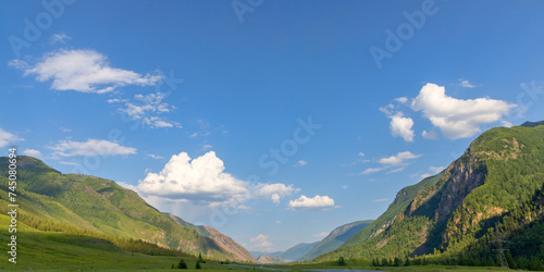 Fototapeta Naklejka Na Ścianę i Meble -  Altai mountains under blue sky and small clouds panorama