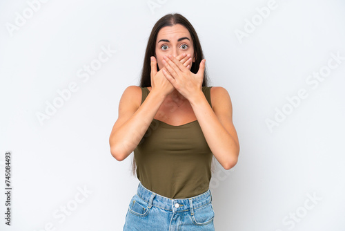 Young caucasian woman isolated on white background covering mouth with hands