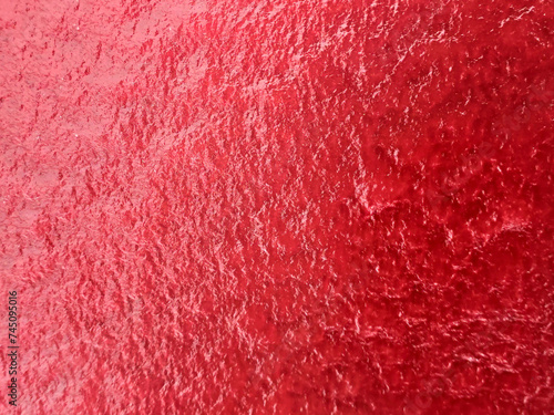 Ice red background. Red ice. Abstract ice texture. Natural background.