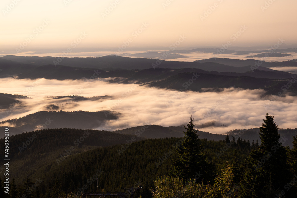 View above the clouds, clouds under mountains, sunrise, Lysá hora, Beskydy, Czech Republic View above the clouds, clouds under mountains, sunrise, Lysá hora, Beskydy, Czech Republic