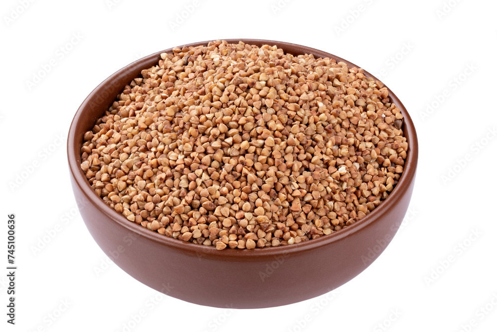 Green buckwheat grain in clay bowl isolated on white background. File contains clipping path. Green buckwheat grain in clay bowl isolated on white background. File contains clipping path.