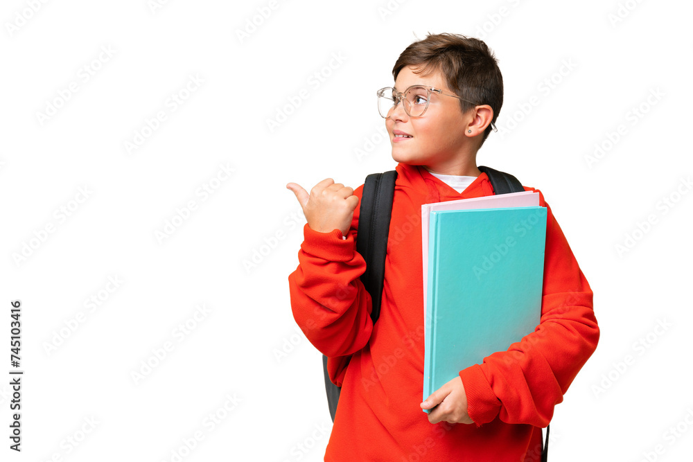 Little caucasian student kid over isolated chroma key background pointing to the side to present a product Little caucasian student kid over isolated chroma key background pointing to the side to present a product