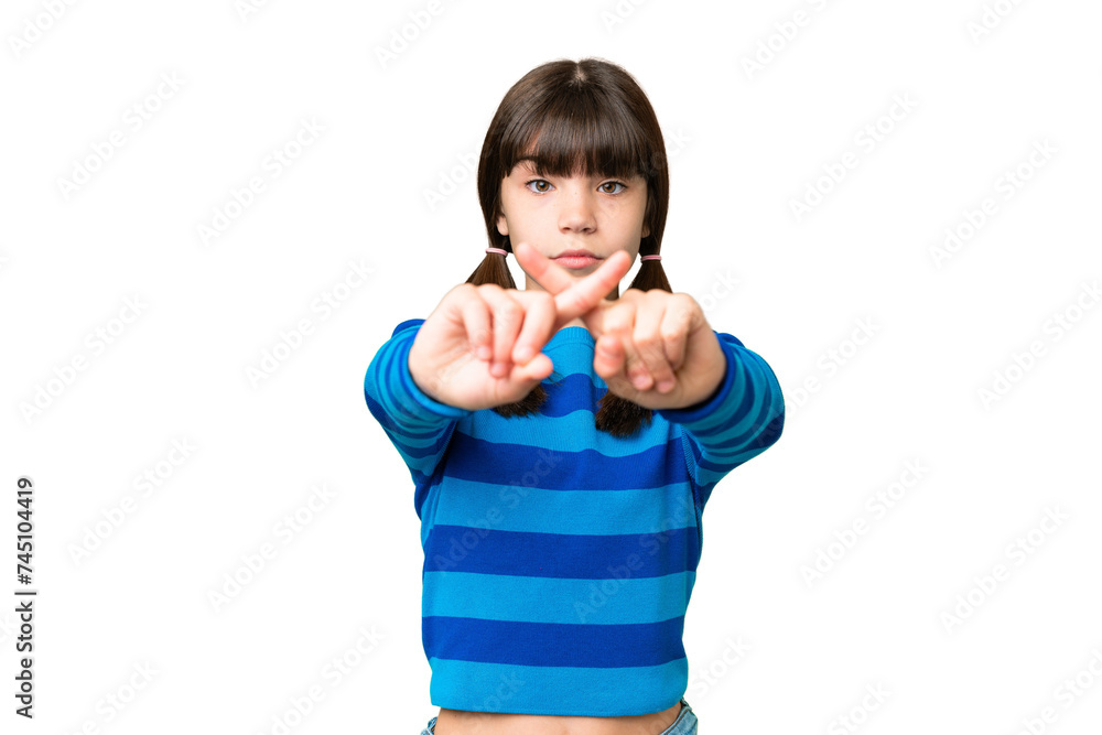 Little caucasian girl over isolated background making stop gesture with her hand to stop an act Little caucasian girl over isolated background making stop gesture with her hand to stop an act