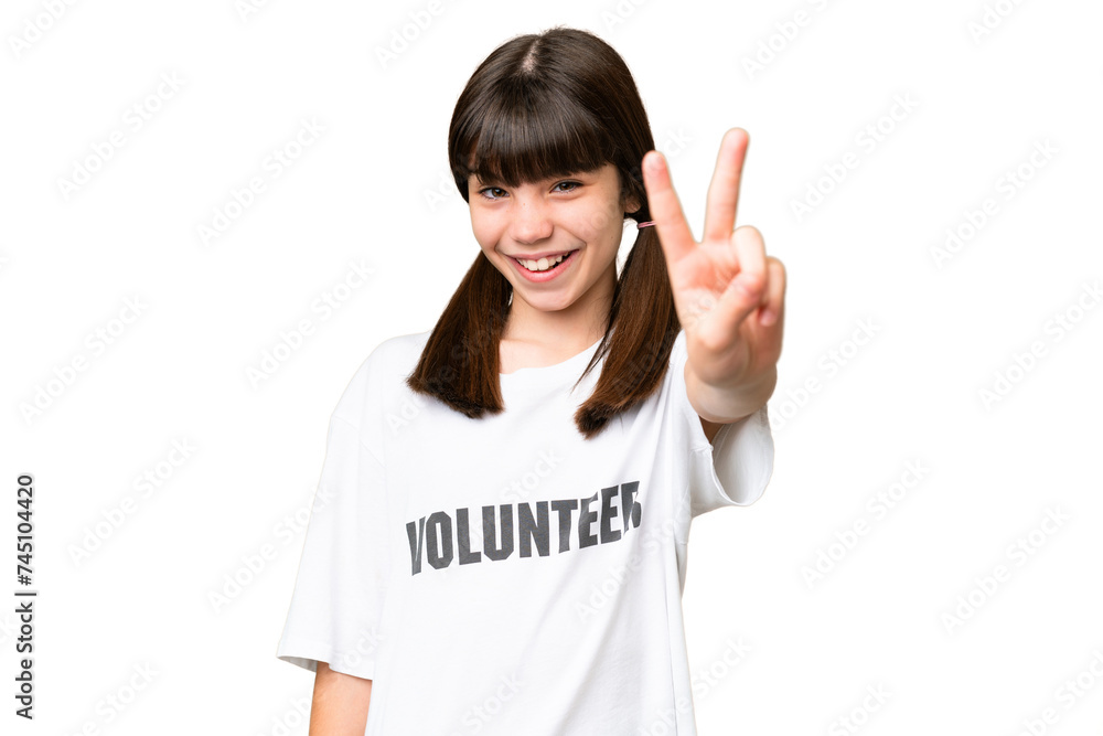 Little volunteer girl over isolated background smiling and showing victory sign Little volunteer girl over isolated background smiling and showing victory sign