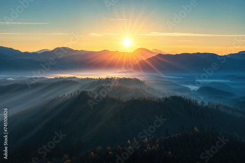 Dramatic Sunrise over the Mountains. Colourful Nature Background. photo