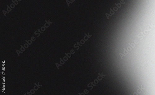 Grey white illuminated spots on black, grainy color gradient background, noise texture effect, copy space 