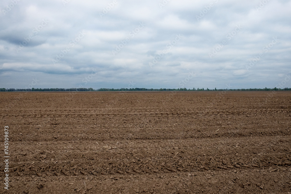 The horizon shows where tilled earth meets the sky.