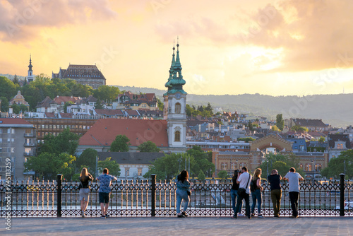 Panorama of Buda from Kossuth Lajos square, people watching photo