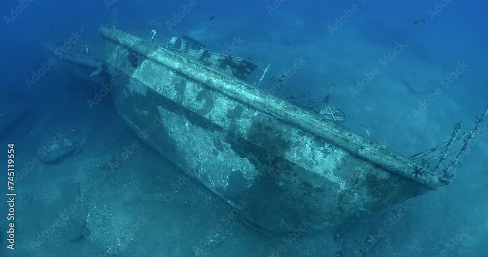 wreck underwater shipwreck on seabed sea floor standing metal on ocean floor some fish around wreck underwater shipwreck on seabed sea floor standing metal on ocean floor some fish around