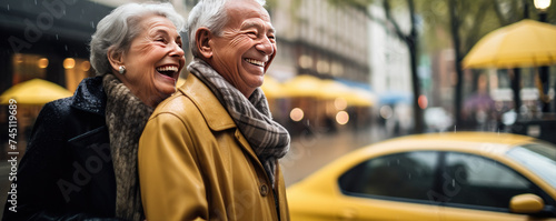 Happy senior couple ejoying their time together in the city. Acvite retirement concept © Filip