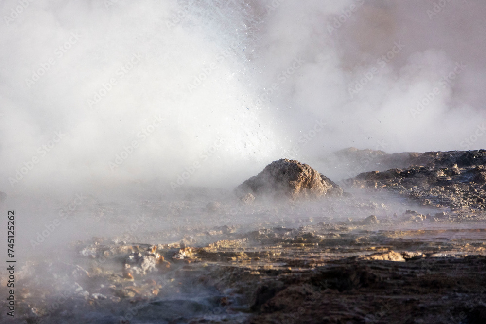 Tatio Geysers, San Pedro de Atacama, Chile, South America. Volcanic hot springs erupting hot water and steam in the mountain regions. 