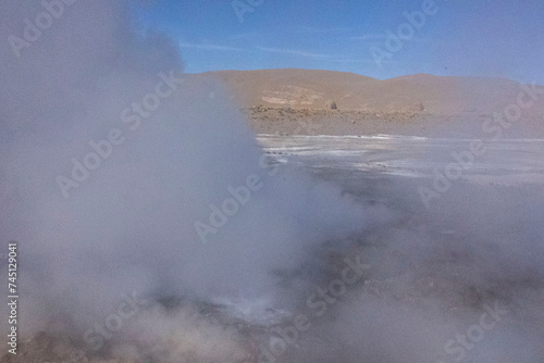 Tatio Geysers in San Pedro de Atacama  Chile  South America. Dramatic volcanic hot springs with rising water and steam