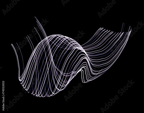 Abstract curved lines on a black background. night photography with lightpainting technique.