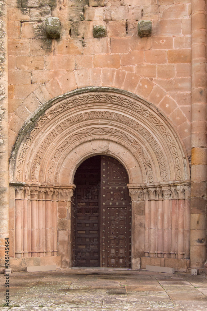 Romanesque entrance with archivolts of the cathedral of Santa Maria de Siguenza, province of Guadalajara. Spain