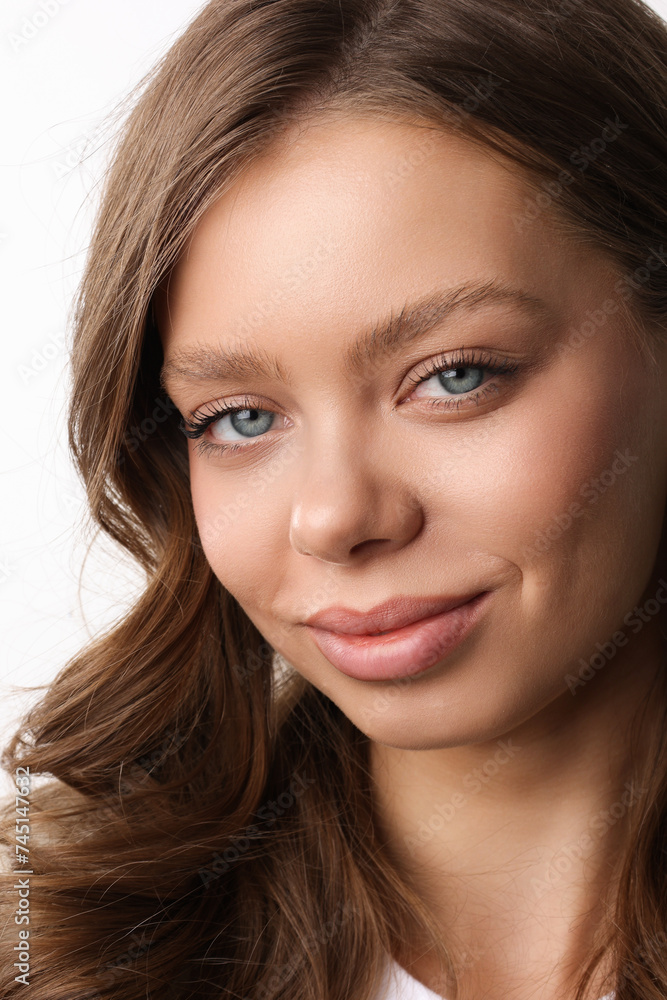 Beautiful young girl with fresh healthy skin. Woman advertise ear-rings. White background. Earrings closeup. Blond european woman with long hair with big lips, pretty smile. Cosmetology, scincare. Beautiful young girl with fresh healthy skin. Woman advertise ear-rings. White background. Earrings closeup. Blond european woman with long hair with big lips, pretty smile. Cosmetology, scincare.