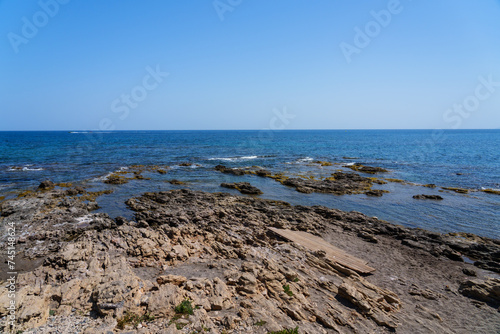 Sea  beautyful sea coast with rocks in sunny day.