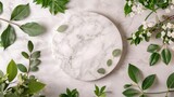 Top view of empty marble podium and green leaves on light blue background . Pedestal and fresh natural leaf for cosmetic advertising. Eco product presentation mockup. flat lay