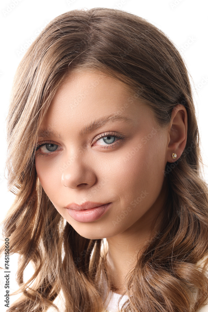 Beautiful young girl with fresh healthy skin. Woman advertise ear-rings. White background. Earrings closeup. Blond european woman with long hair with big lips, pretty smile. Cosmetology, scincare Beautiful young girl with fresh healthy skin. Woman advertise ear-rings. White background. Earrings closeup. Blond european woman with long hair with big lips, pretty smile. Cosmetology, scincare