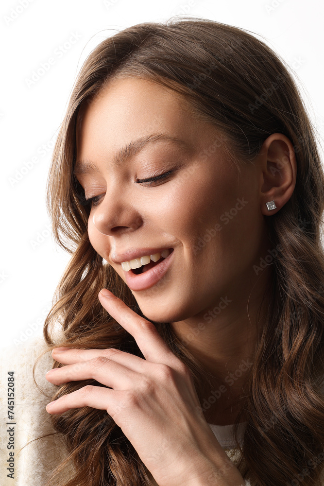 Beautiful young girl with fresh healthy skin. Woman advertise ear-rings. White background. Earrings closeup. Blond european woman with long hair with big lips, pretty smile. Cosmetology, scincare Beautiful young girl with fresh healthy skin. Woman advertise ear-rings. White background. Earrings closeup. Blond european woman with long hair with big lips, pretty smile. Cosmetology, scincare