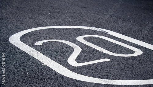 20mph speed sign painted on asphalt  © WD Stockphotos