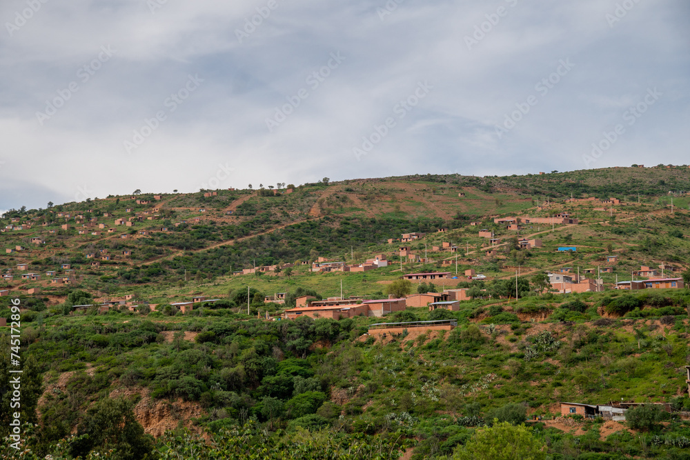 Fototapeta premium neighbourhoods of houses built on a hill, underdevelopment in Latin America. Settlements 