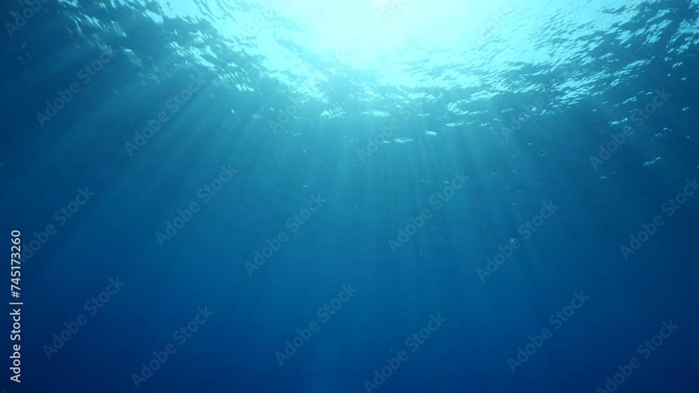 sun ray and sun beam scenery underwater waves on surface of water slow ocean scenery for background sun ray and sun beam scenery underwater waves on surface of water slow ocean scenery for background